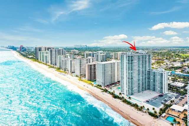 a view of a balcony and floor to ceiling window
