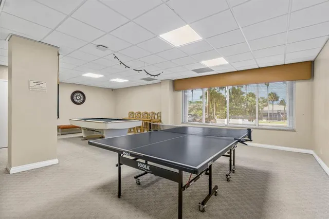 a room with furniture and a large window