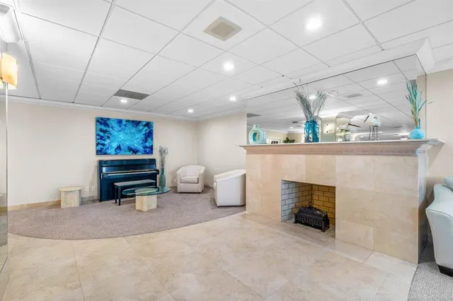 a room with furniture and a fireplace