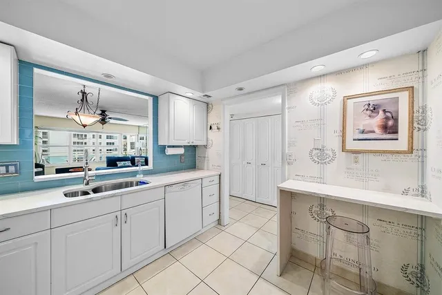 a spacious bathroom with a double vanity sink mirror and