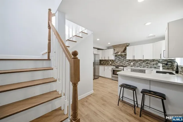 a dining room with furniture and a fireplace