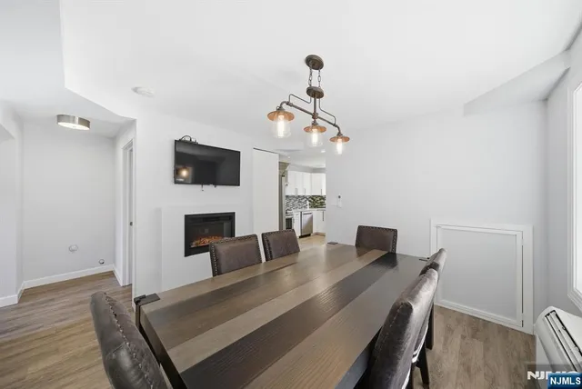 a view of backyard with a deck and wooden floor