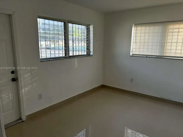 a bathroom with a sink and toilet