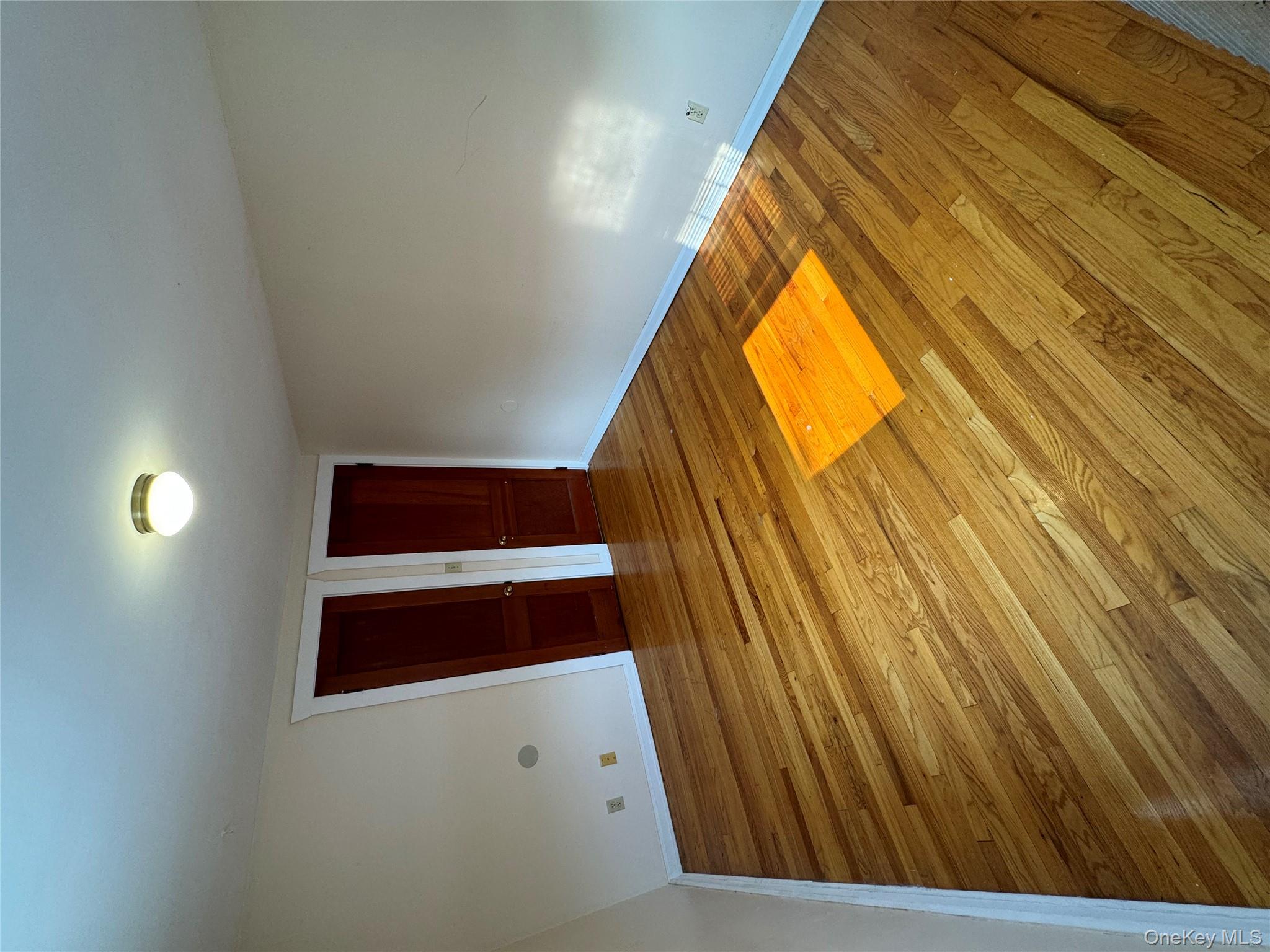 560 State Rte 44 55, Unit D Highland, NY 12528 - Photo 11 of 13 Spare room featuring light wood-style floors