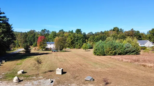 a view of a backyard of a house