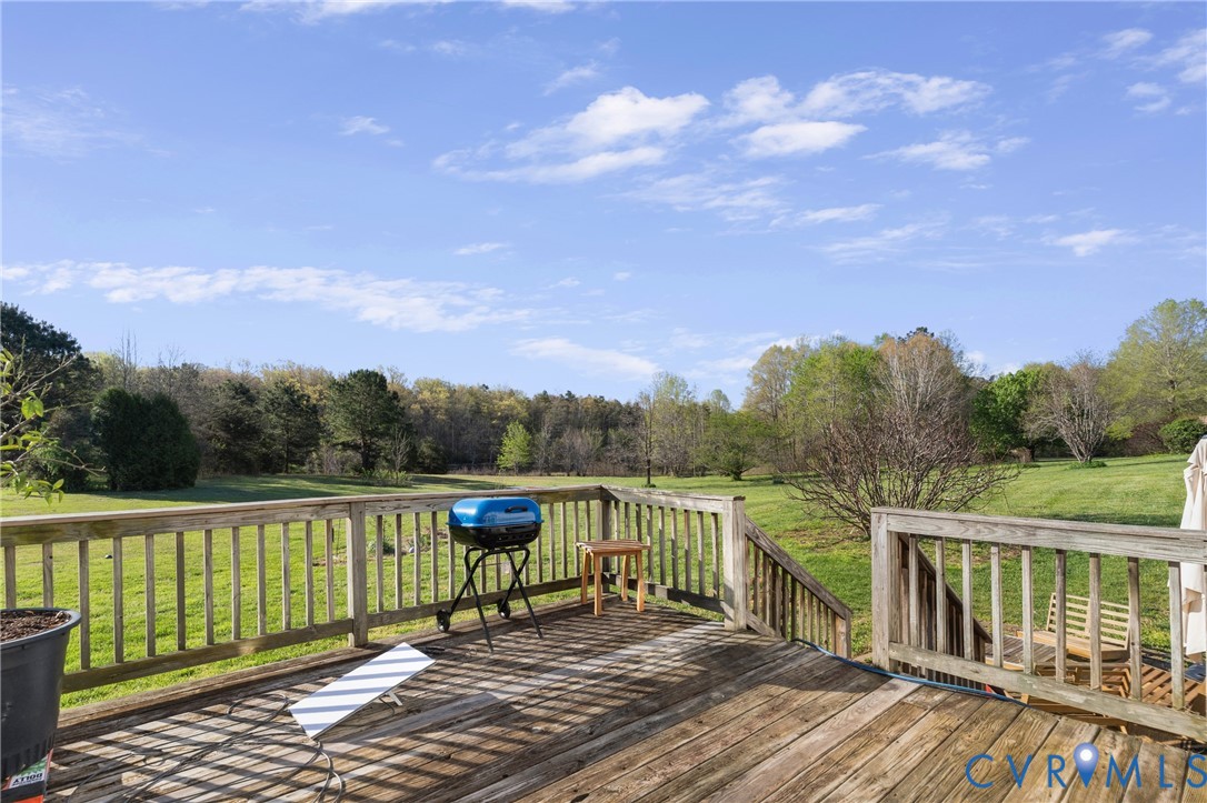 15286 Devonwood Road Montpelier, VA 23192 - Photo 21 of 50 Deck featuring a lawn and a grill