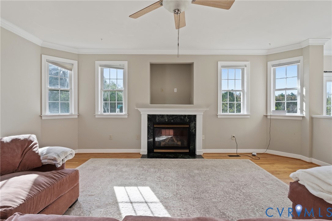 15286 Devonwood Road Montpelier, VA 23192 - Photo 27 of 50 Living area with a ceiling fan, ornamental molding