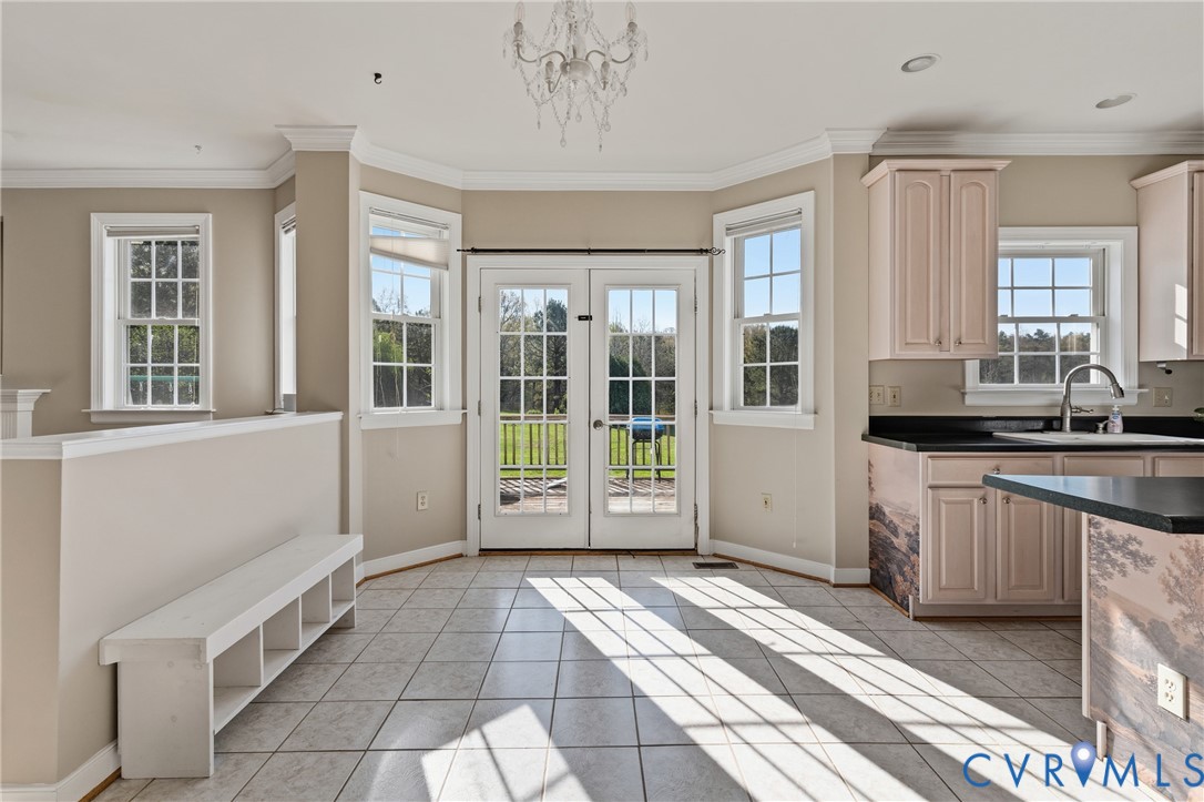 15286 Devonwood Road Montpelier, VA 23192 - Photo 31 of 50 Doorway featuring tile patterned floors, crown mol