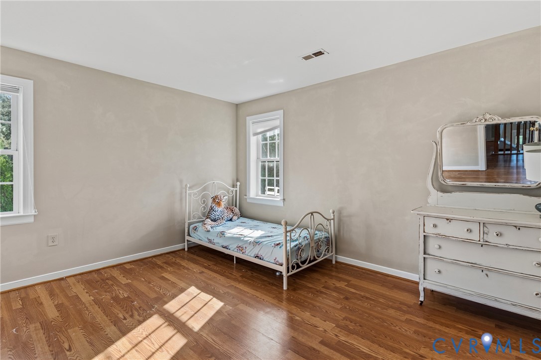 15286 Devonwood Road Montpelier, VA 23192 - Photo 38 of 50 Bedroom with dark wood-type flooring