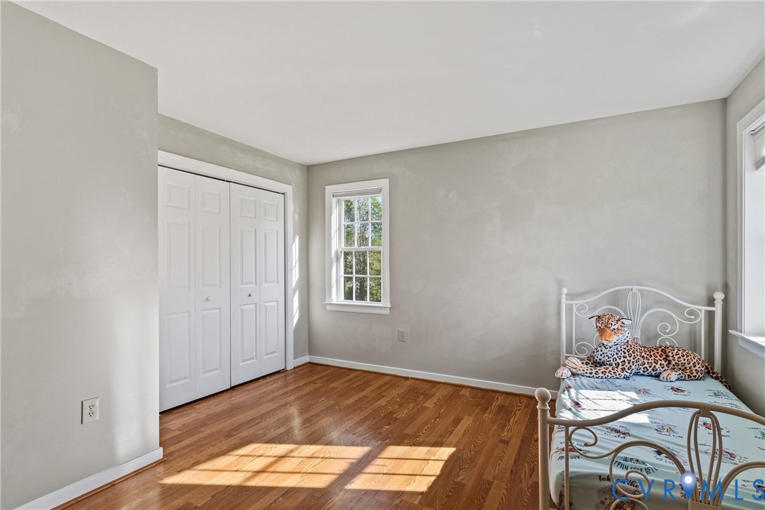 15286 Devonwood Road Montpelier, VA 23192 - Photo 39 of 50 Unfurnished bedroom with wood finished floors and