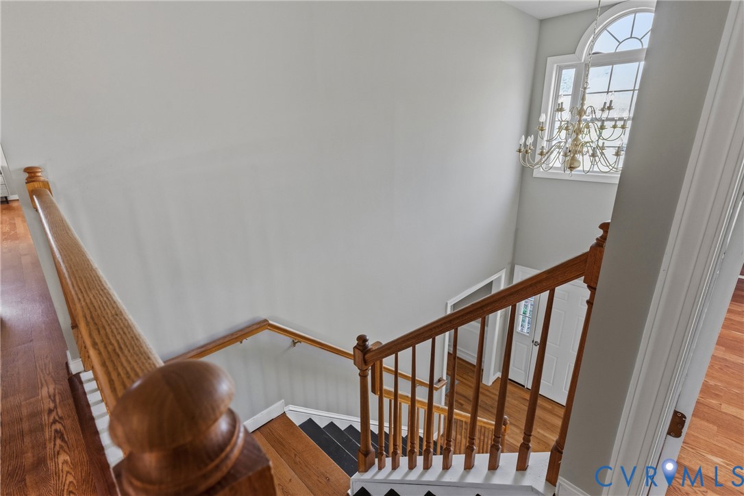 15286 Devonwood Road Montpelier, VA 23192 - Photo 41 of 50 Stairs with wood finished floors and suspended lig