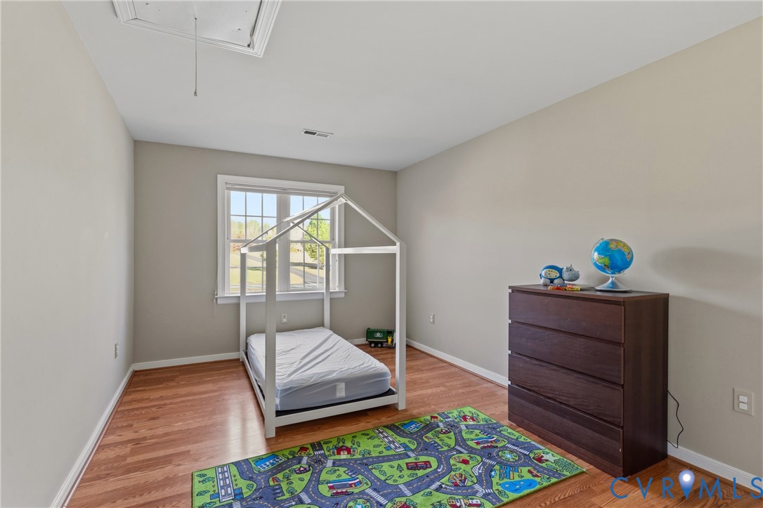 15286 Devonwood Road Montpelier, VA 23192 - Photo 43 of 50 Bedroom with light wood finished floors