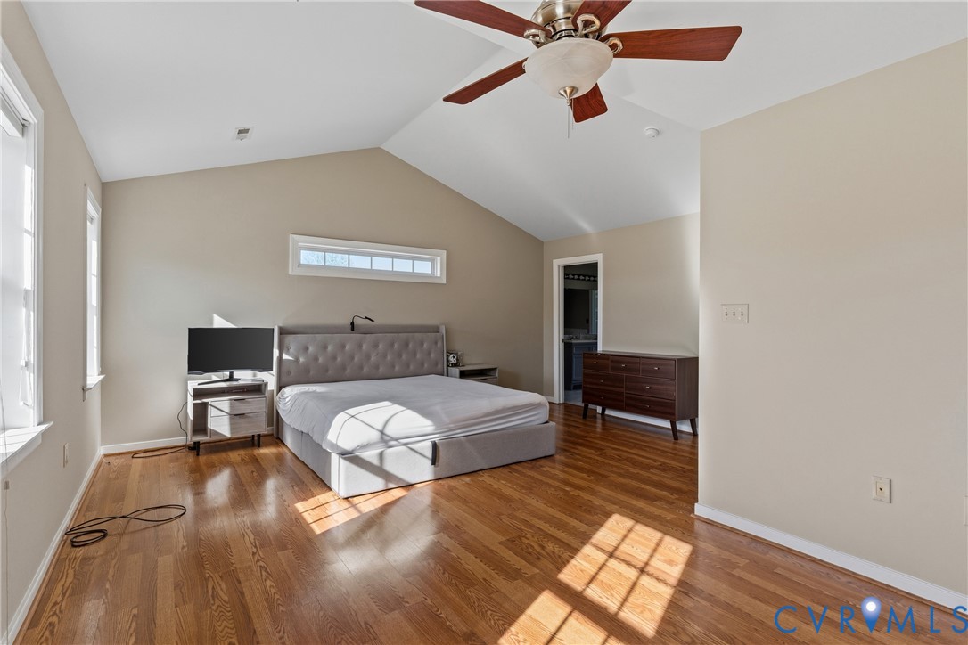 15286 Devonwood Road Montpelier, VA 23192 - Photo 46 of 50 Bedroom featuring light wood-type flooring, a walk