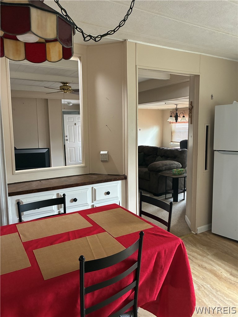 6035-286 South Transit Road, Unit 286 Lockport, NY 14094 - Photo 16 of 48 VIEW WITH PASS THROUGH TO GR ROOM