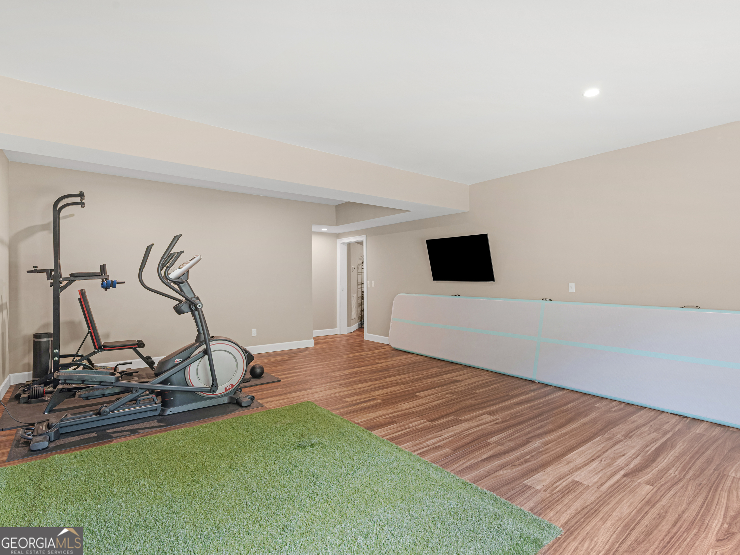 221 Hummingbird Court Hampton, GA 30228 - Photo 66 of 77 a view of a room with gym equipment