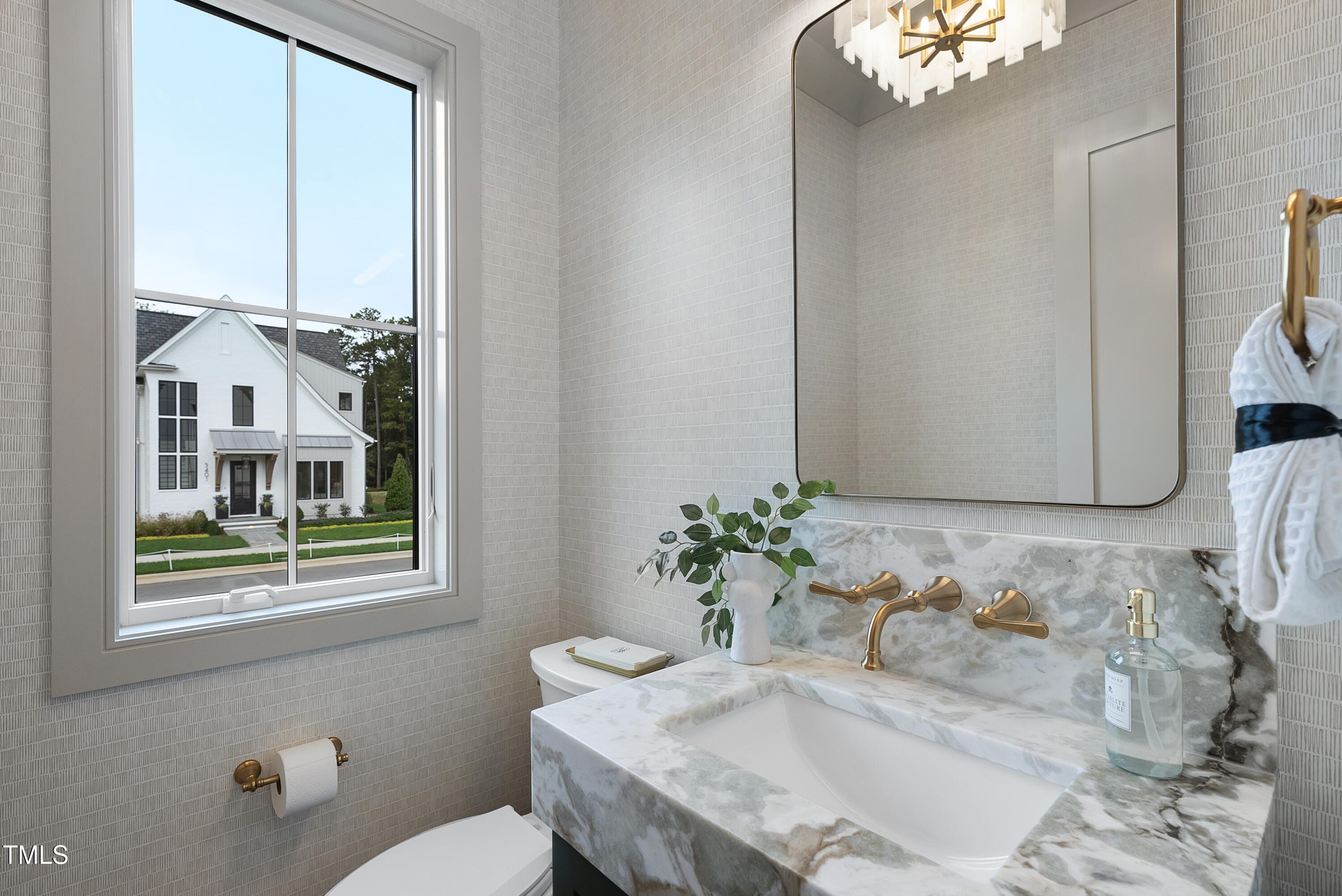 3300 Founding Place Raleigh, NC 27612 - Photo 31 of 100 a bathroom with a granite countertop sink a toilet and a mirror