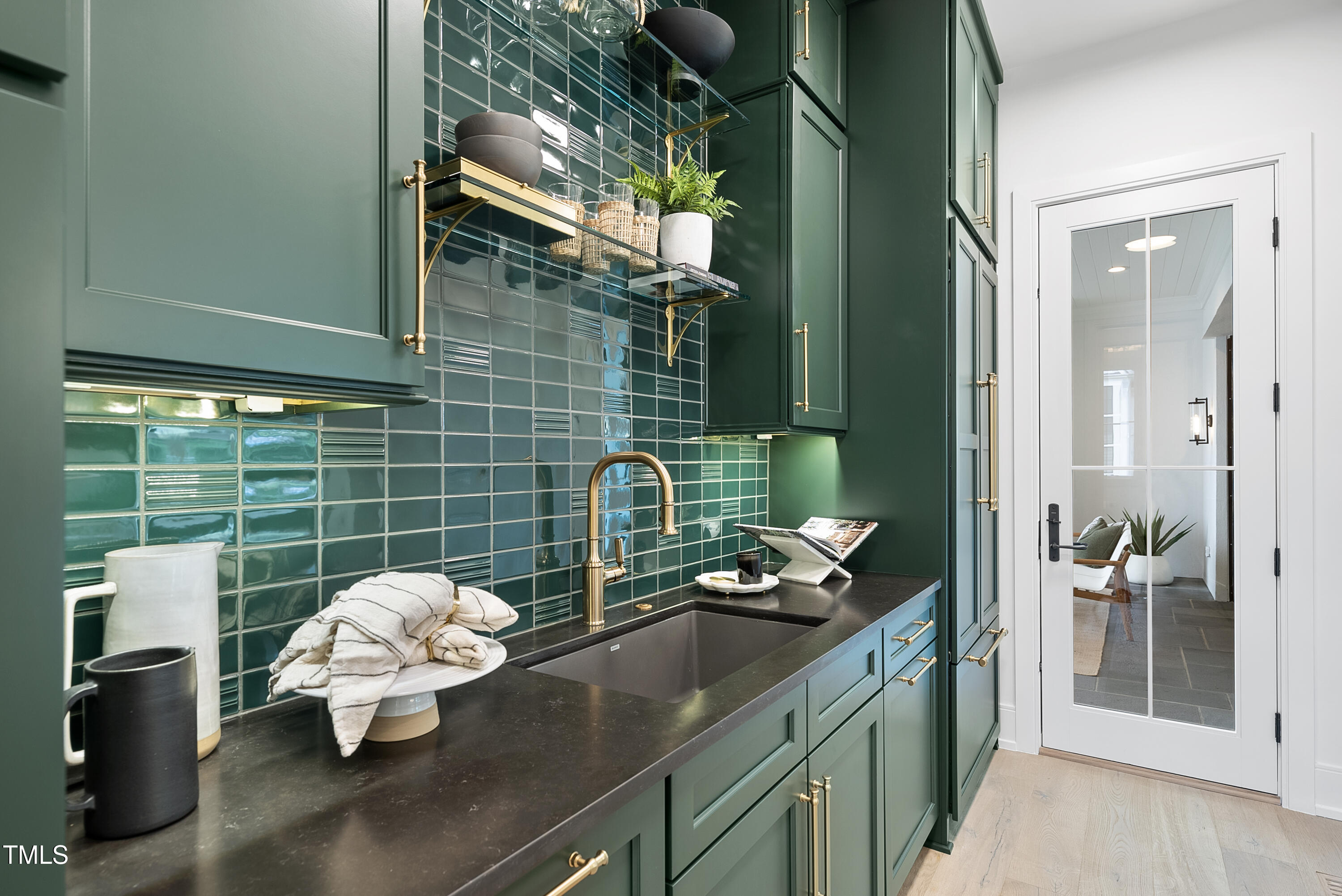 3300 Founding Place Raleigh, NC 27612 - Photo 33 of 100 a kitchen with a sink and a stove top oven
