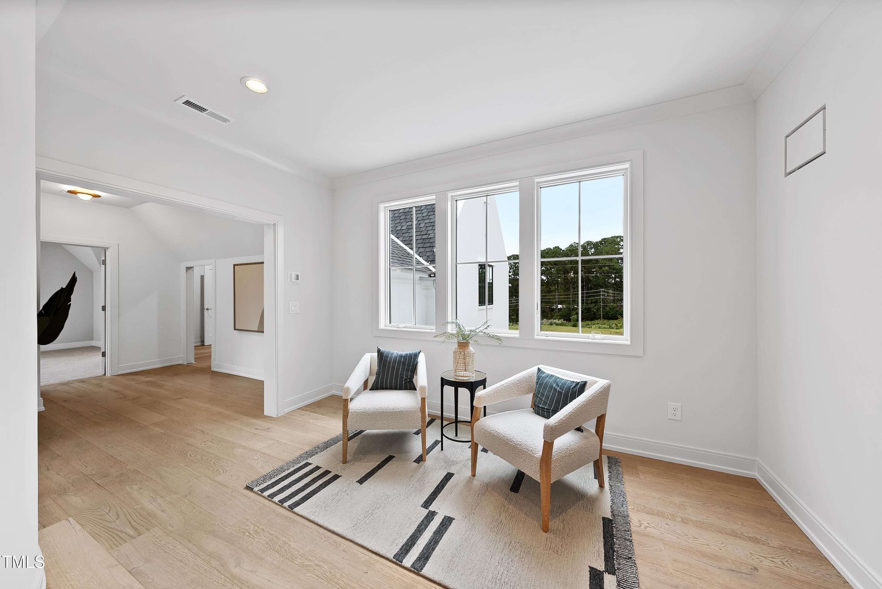 3300 Founding Place Raleigh, NC 27612 - Photo 51 of 100 a living room with furniture and a large window