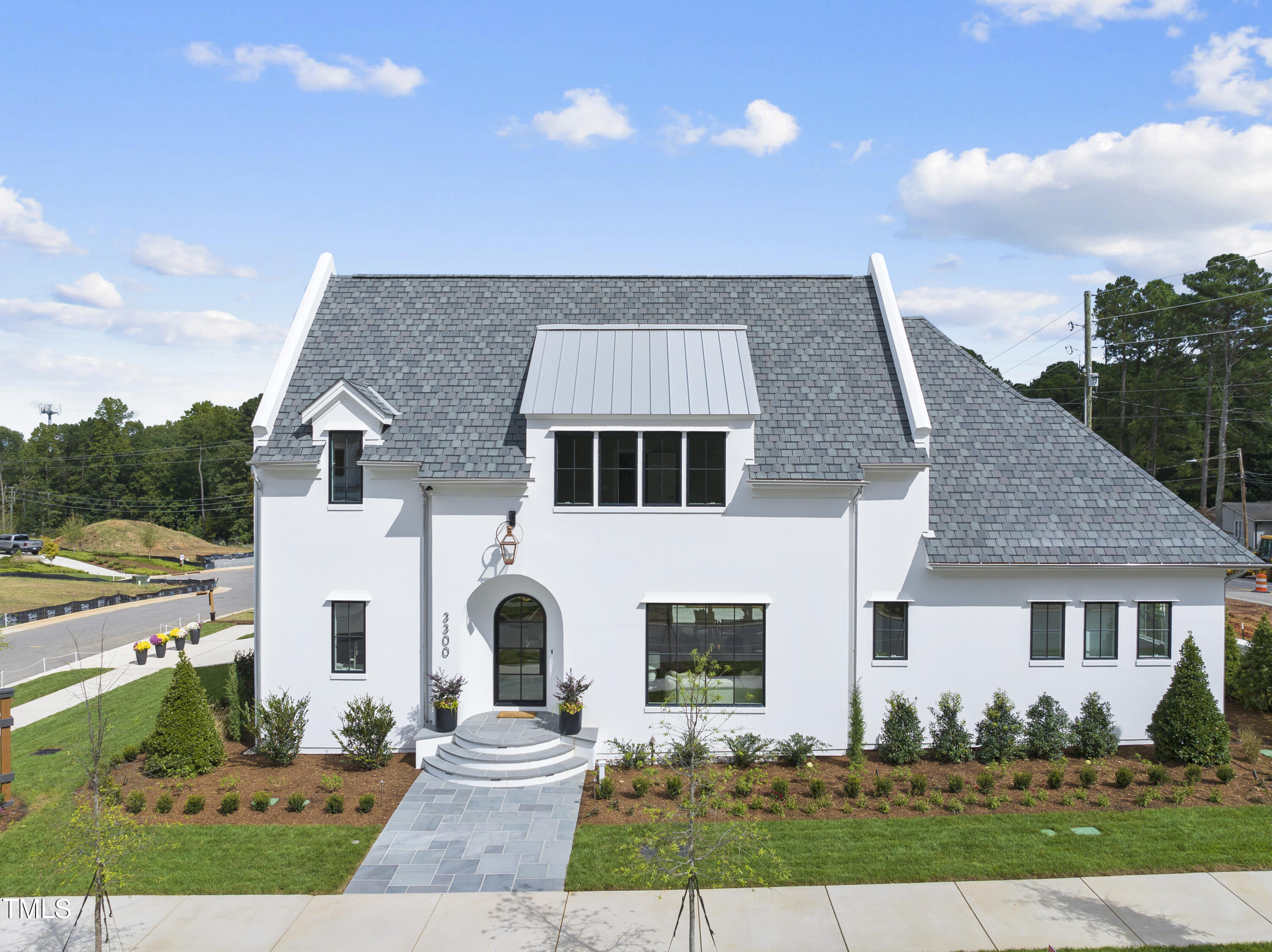 3300 Founding Place Raleigh, NC 27612 - Photo 9 of 100 a front view of a house with a garden and yard