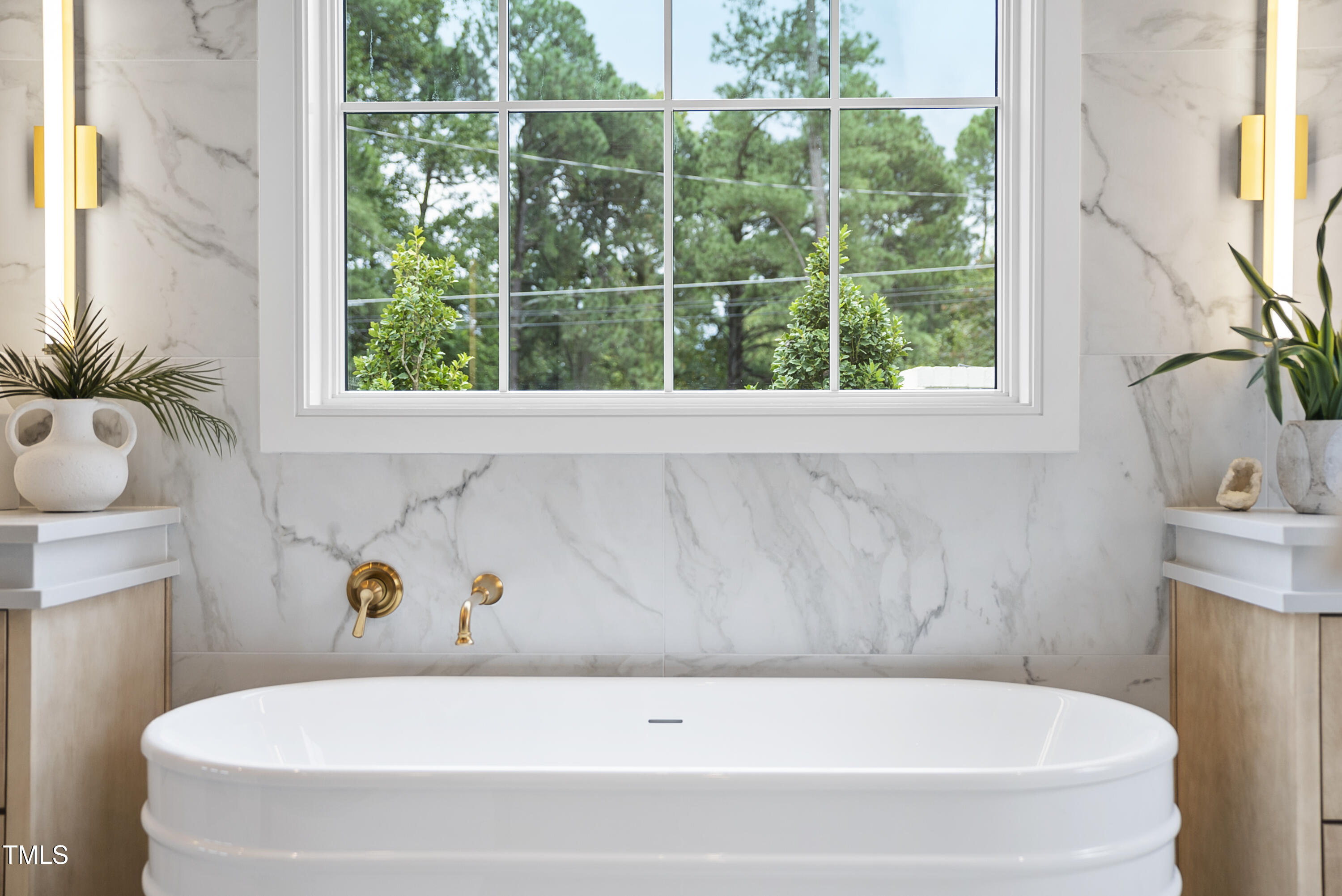3300 Founding Place Raleigh, NC 27612 - Photo 99 of 100 a bathroom with a tub and sink