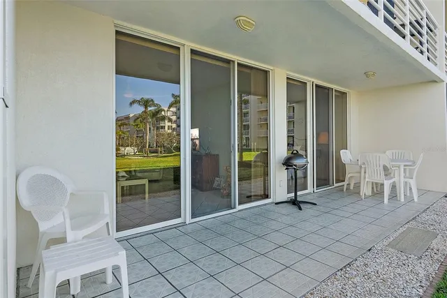 a view of livingroom with furniture and windows