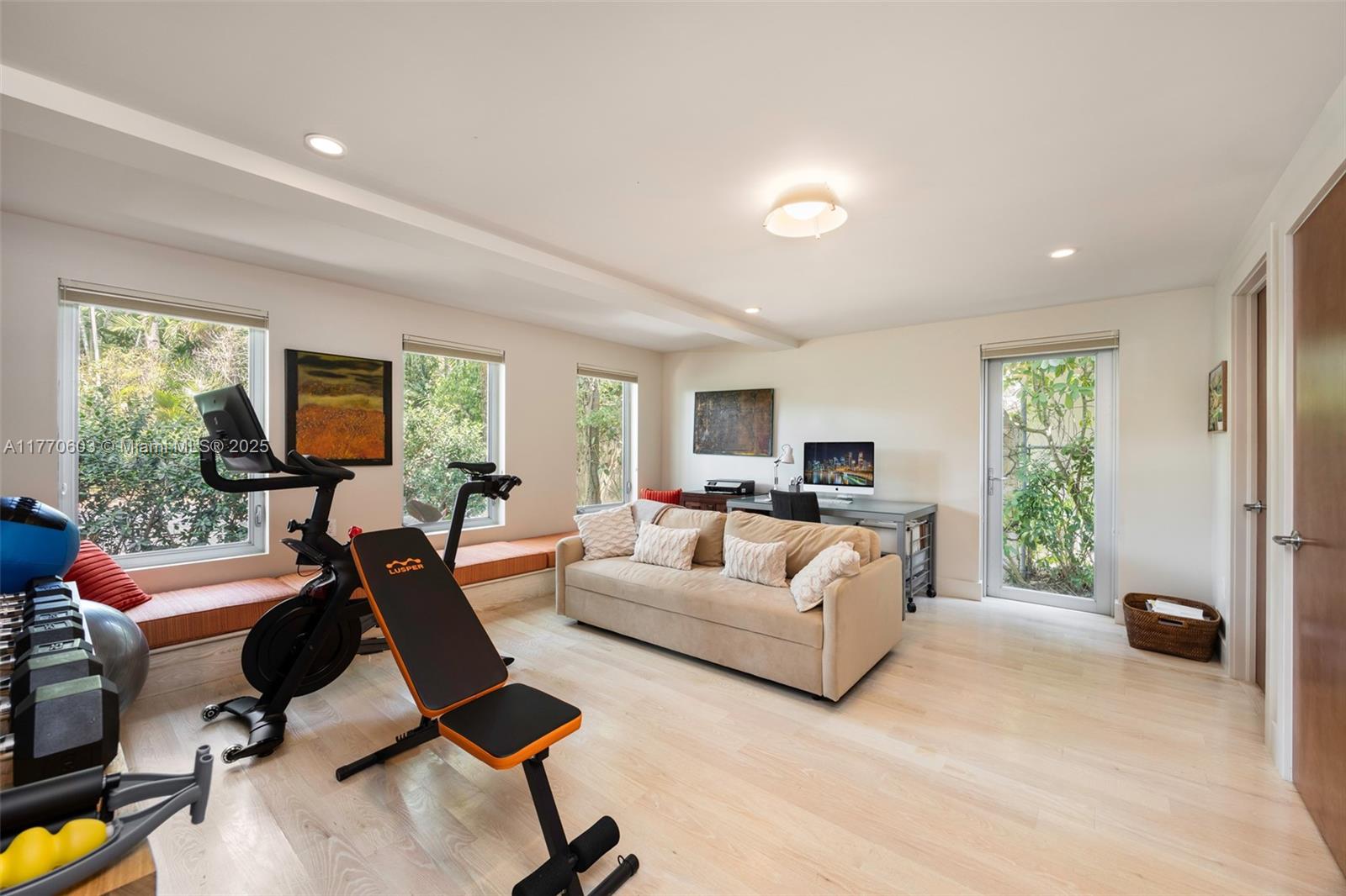 4140 Battersea Road Coconut Grove, FL 33133 - Photo 13 of 37 a living room with furniture and a flat screen tv