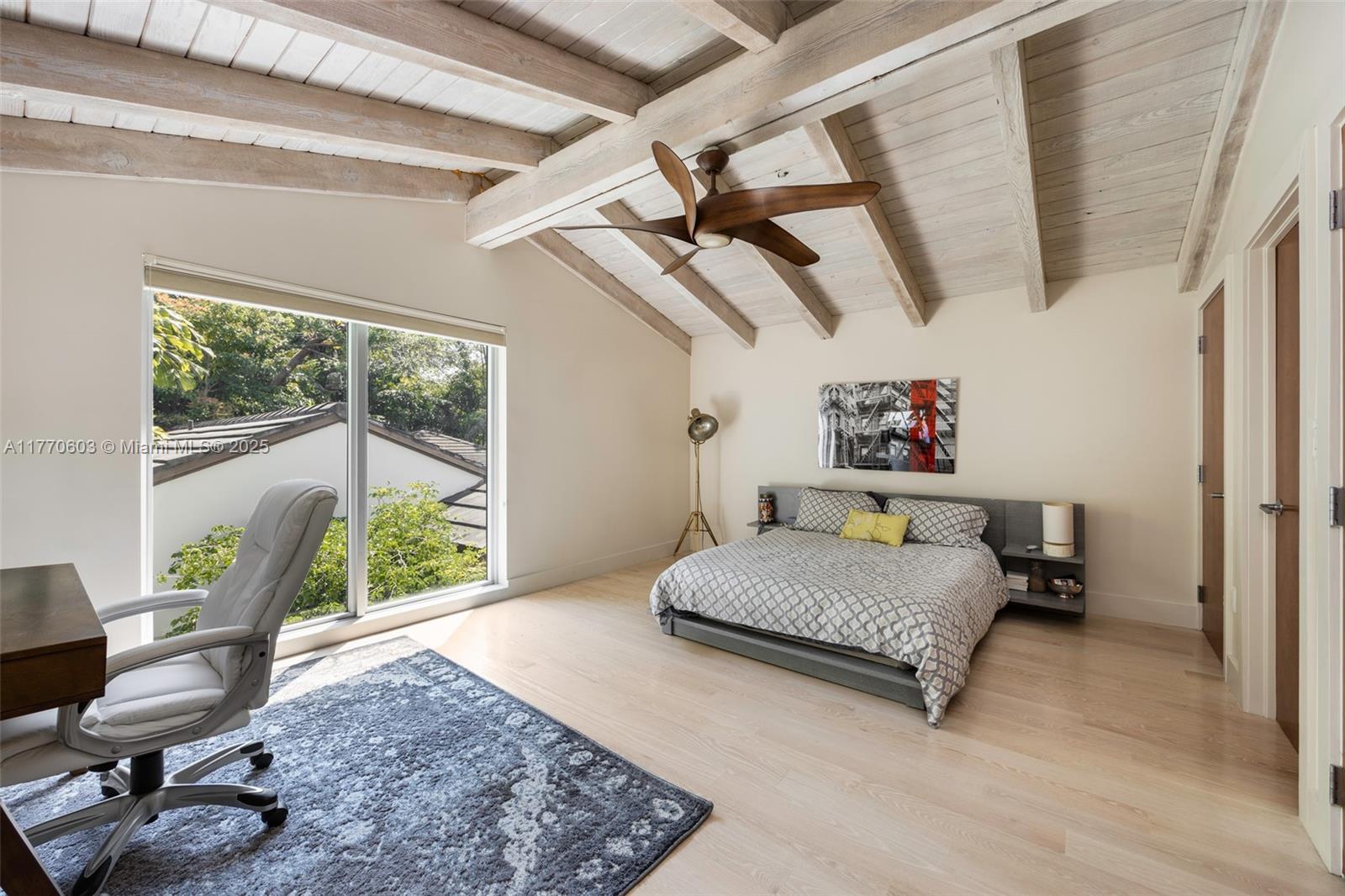 4140 Battersea Road Coconut Grove, FL 33133 - Photo 21 of 37 a bedroom with a bed and a window