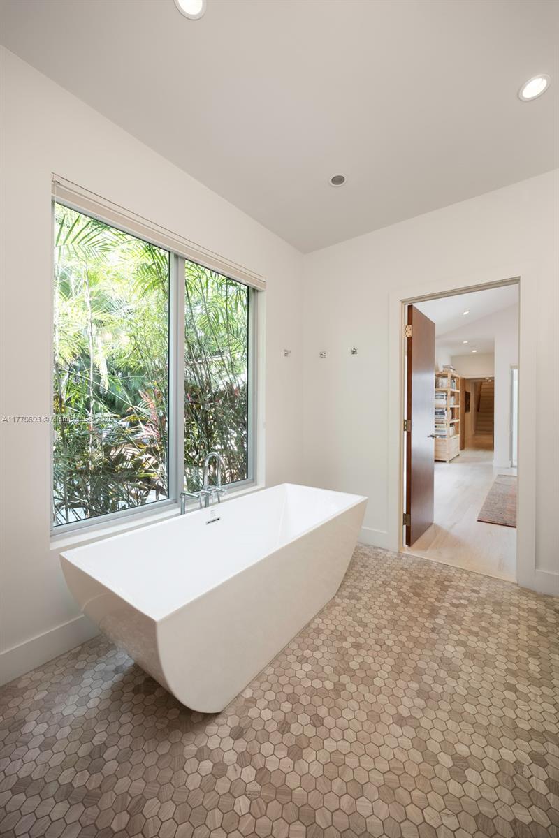 4140 Battersea Road Coconut Grove, FL 33133 - Photo 24 of 37 a view of an empty room with window