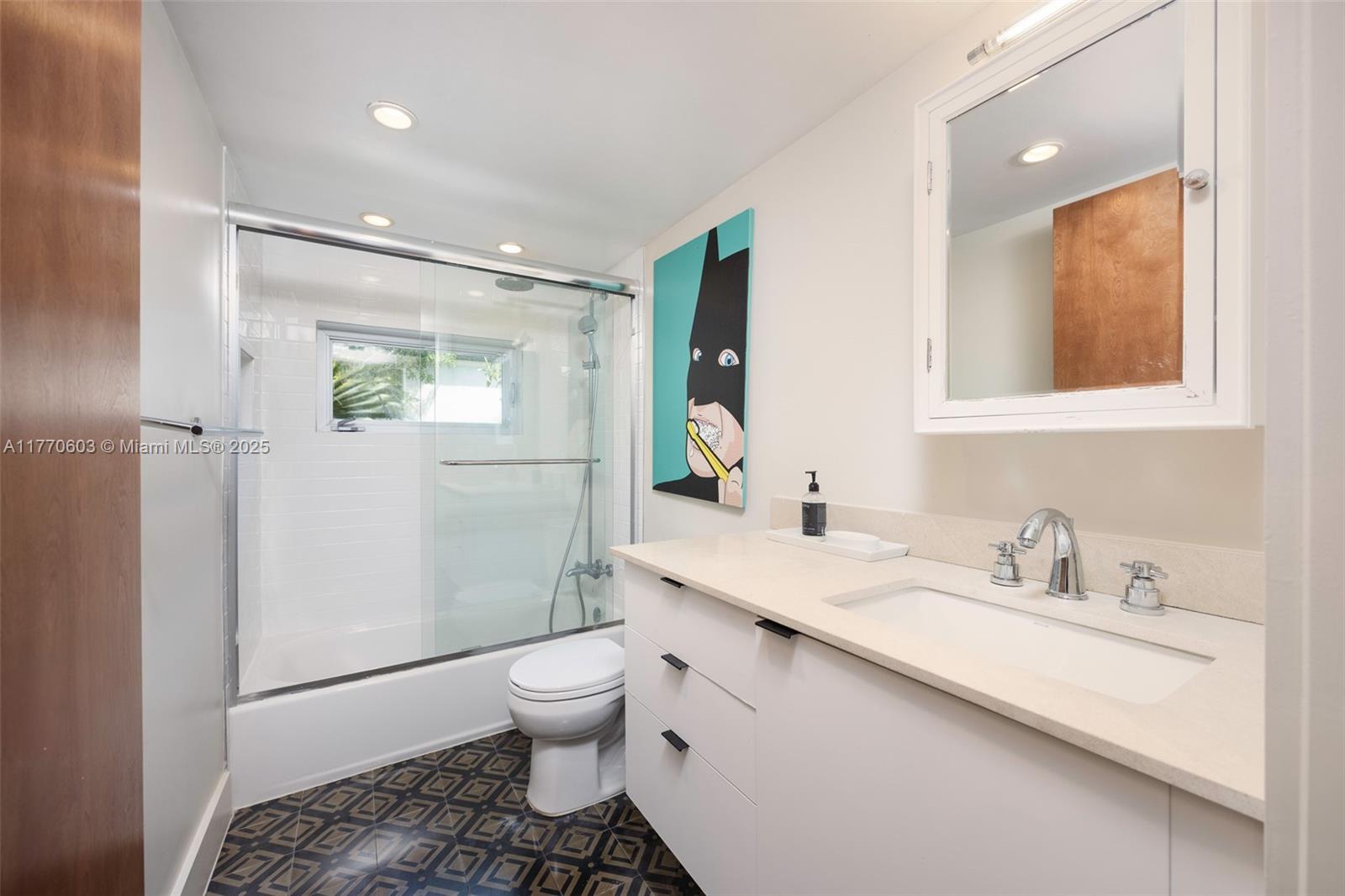 4140 Battersea Road Coconut Grove, FL 33133 - Photo 25 of 37 a bathroom with a sink a toilet and shower