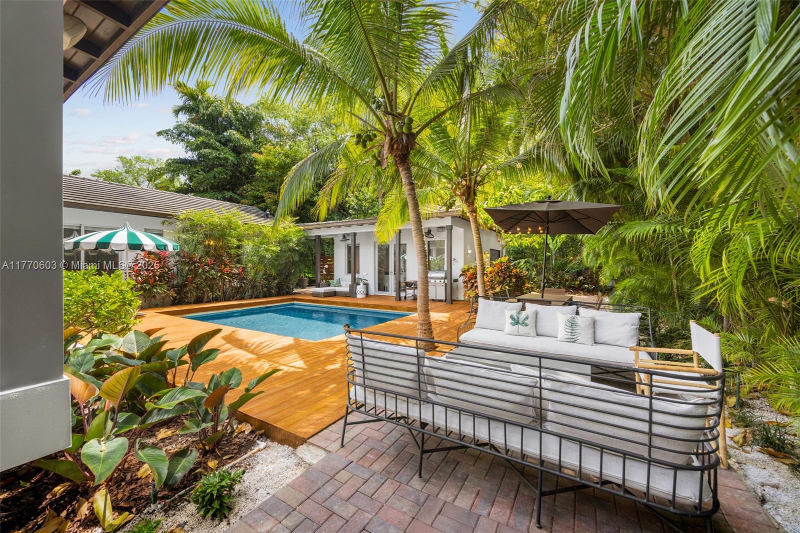4140 Battersea Road Coconut Grove, FL 33133 - Photo 31 of 37 a view of patio with swimming pool