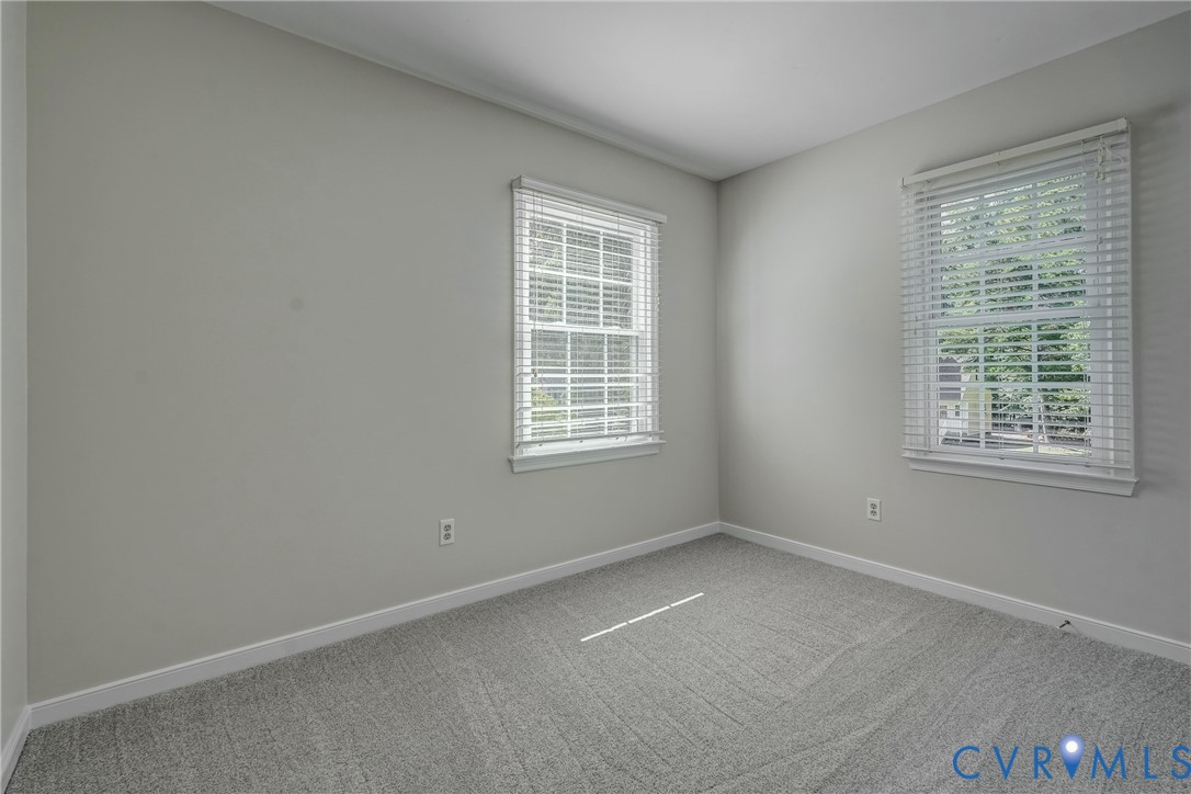 5016 Eddings Drive Glen Allen, VA 23060 - Photo 16 of 22 an empty room with a window