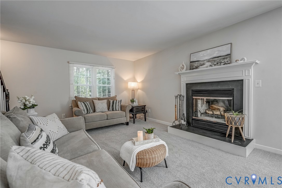 5016 Eddings Drive Glen Allen, VA 23060 - Photo 3 of 22 a living room with furniture and a fireplace