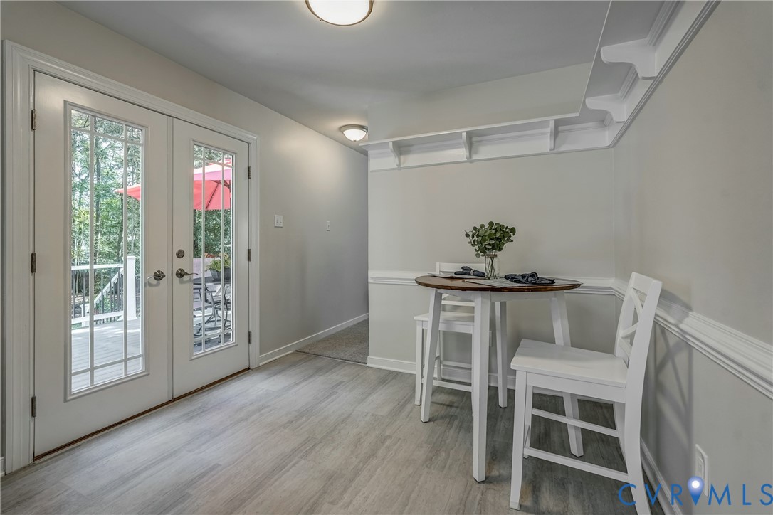 5016 Eddings Drive Glen Allen, VA 23060 - Photo 8 of 22 a dining room with furniture and wooden floor