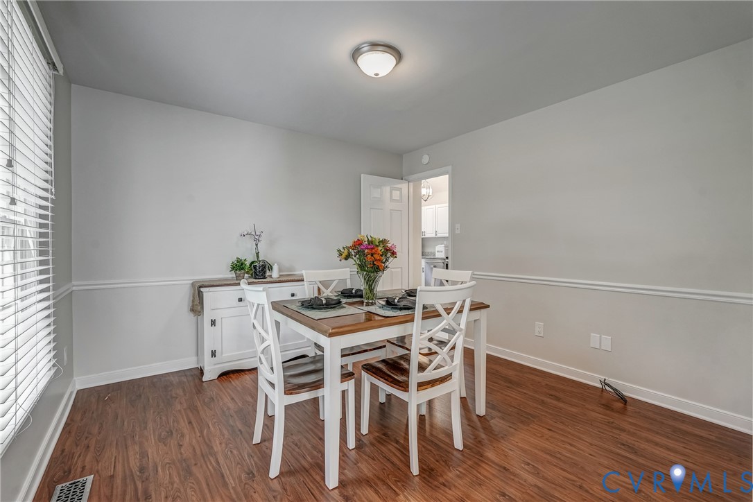 5016 Eddings Drive Glen Allen, VA 23060 - Photo 10 of 22 a view of a dining room with furniture and wooden floor