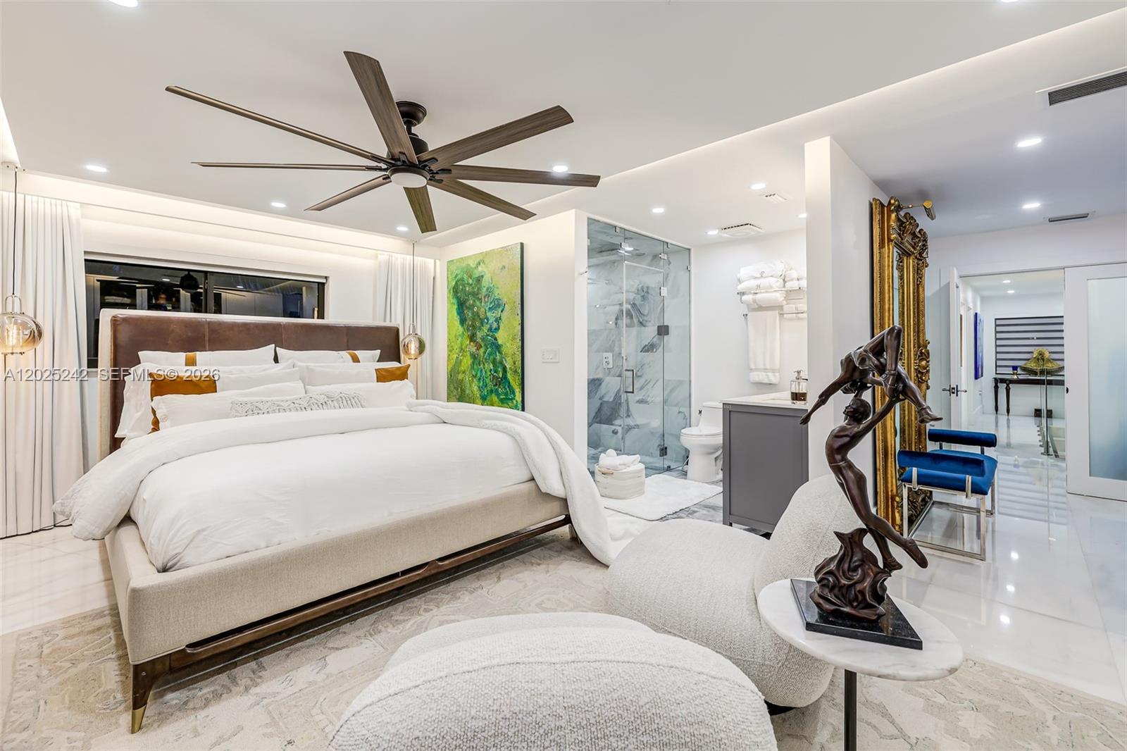 8761 Southwest 56th Street Miami, FL 33165 - Photo 46 of 90 a bedroom with a bed gym equipment and a large window