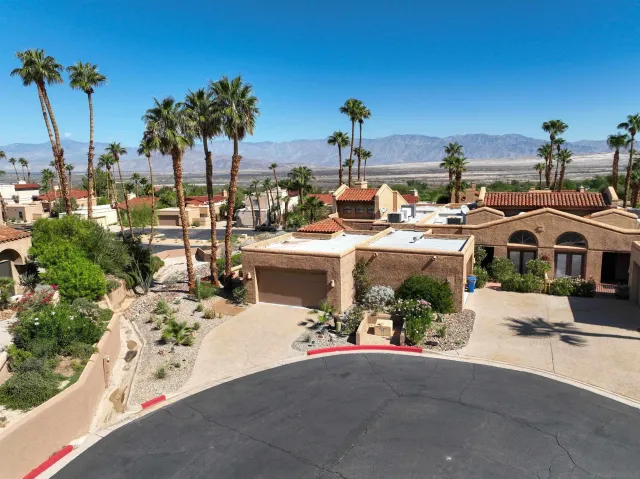 a view of a patio with sitting area