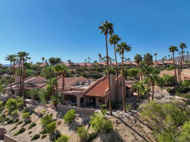 a view of a house with a garden