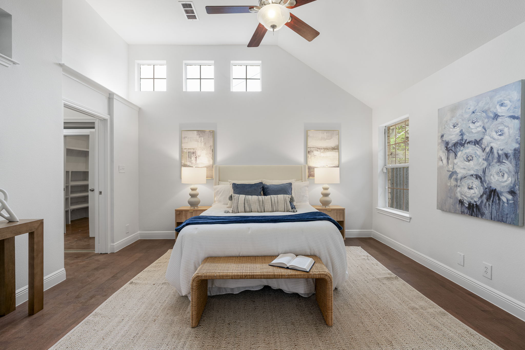 1129 Cedar Pass Road Driftwood, TX 78619 - Photo 20 of 40 Welcome to the primary bedroom. The vaulted ceilings and clerestory windows.