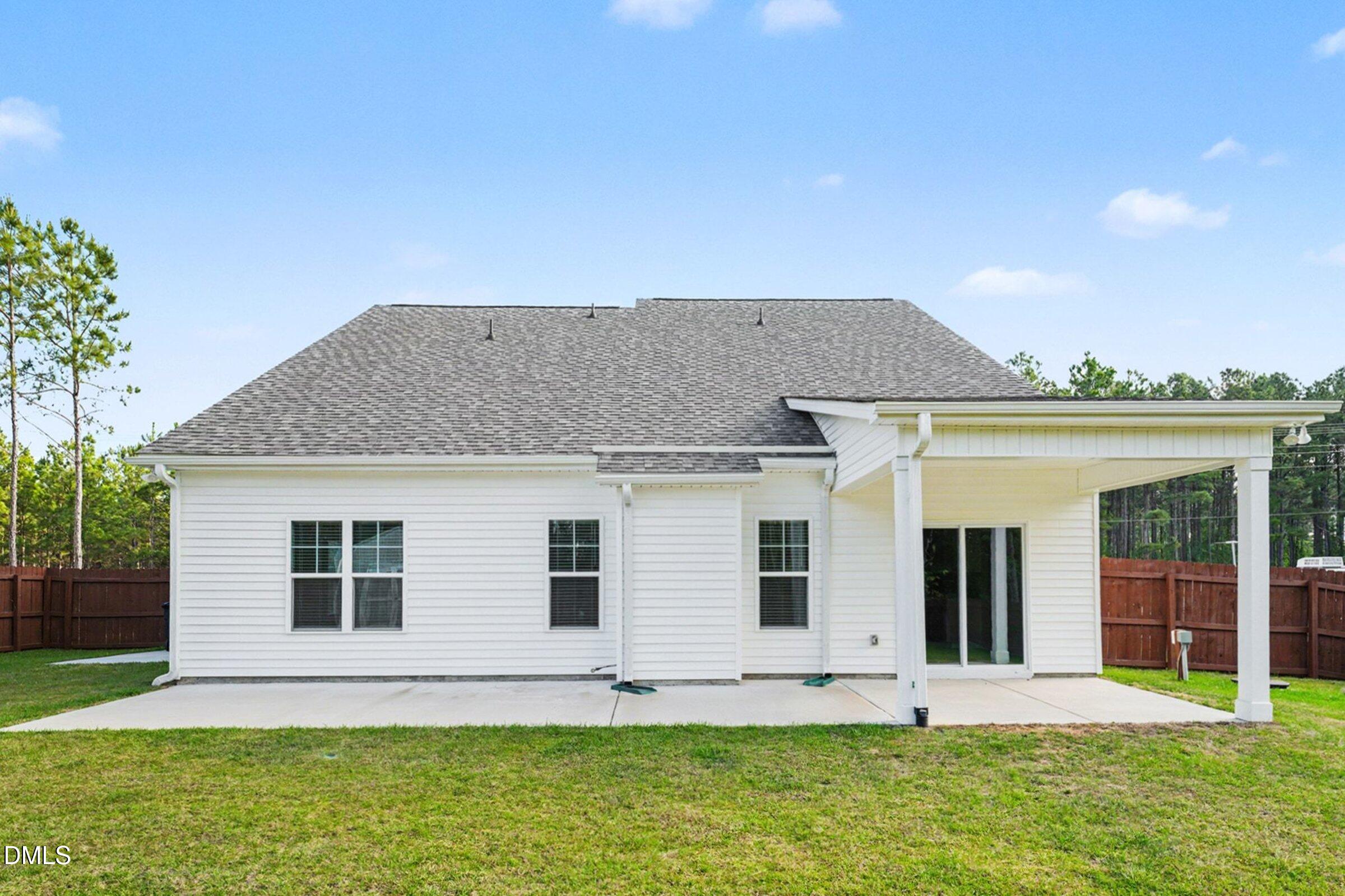 2815 Lemuel Black Road Spring Lake, NC 28390 - Photo 34 of 37 a front view of a house with a yard