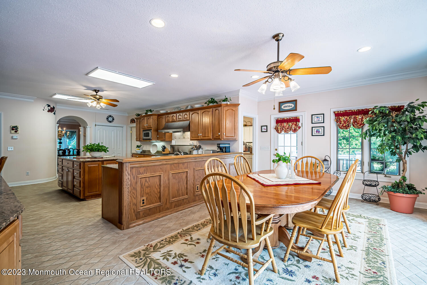1841 Celeste Drive Wall, NJ 07719 - Photo 13 of 107 a view of a dining room kitchen with furniture and a chandelier