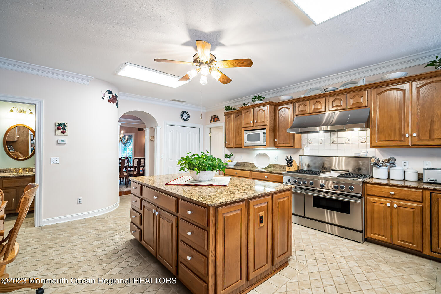 1841 Celeste Drive Wall, NJ 07719 - Photo 17 of 107 a kitchen with stainless steel appliances granite countertop a stove and a sink