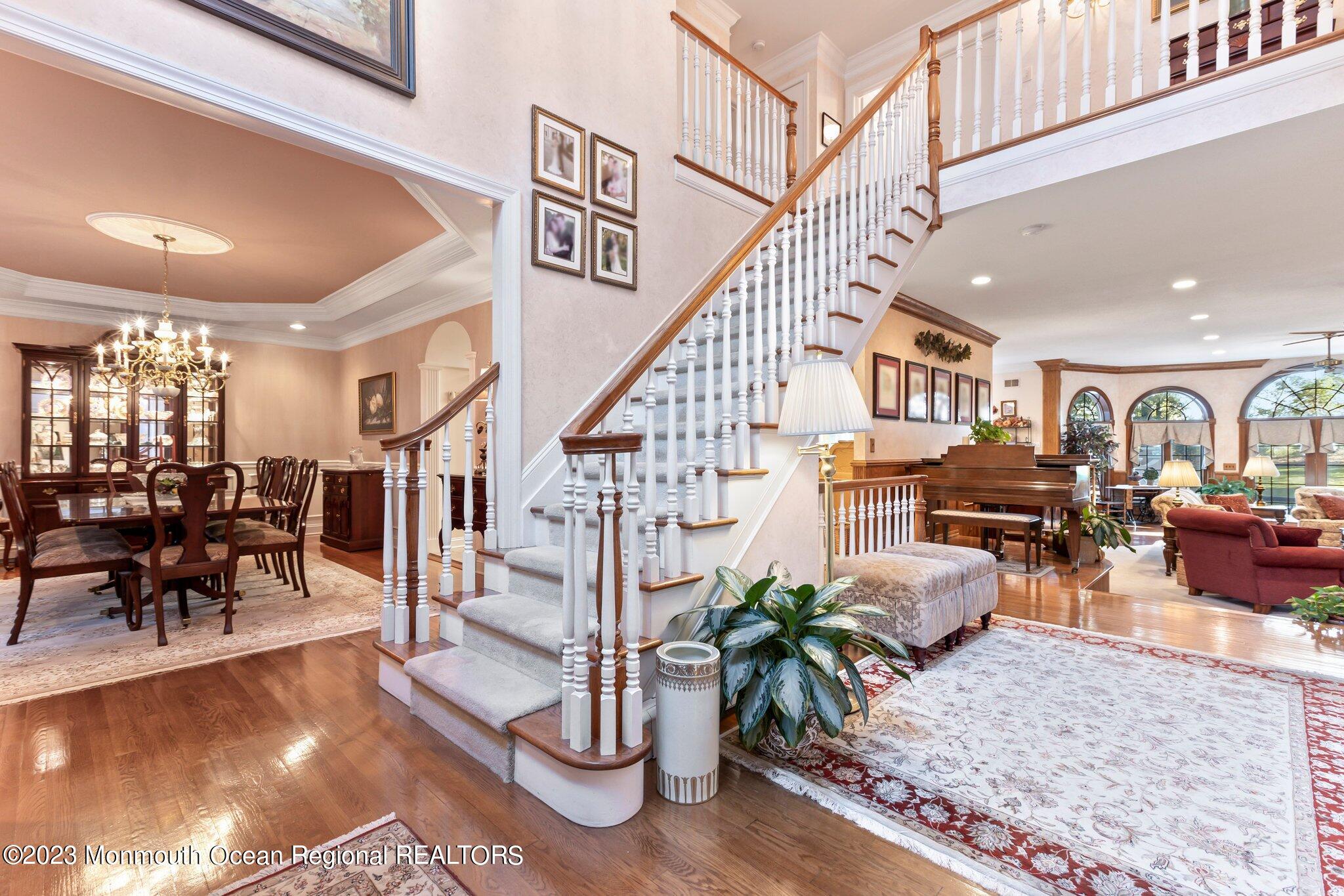 1841 Celeste Drive Wall, NJ 07719 - Photo 4 of 107 a living room with furniture or wooden floor and a potted plant