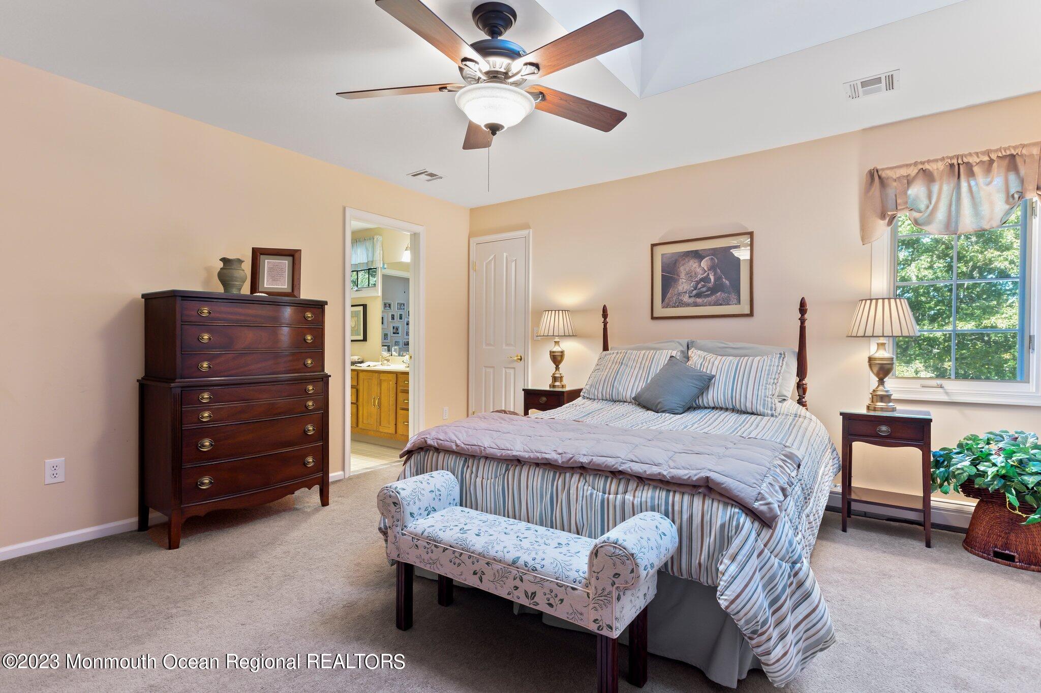 1841 Celeste Drive Wall, NJ 07719 - Photo 44 of 107 a bedroom with a bed and a dresser