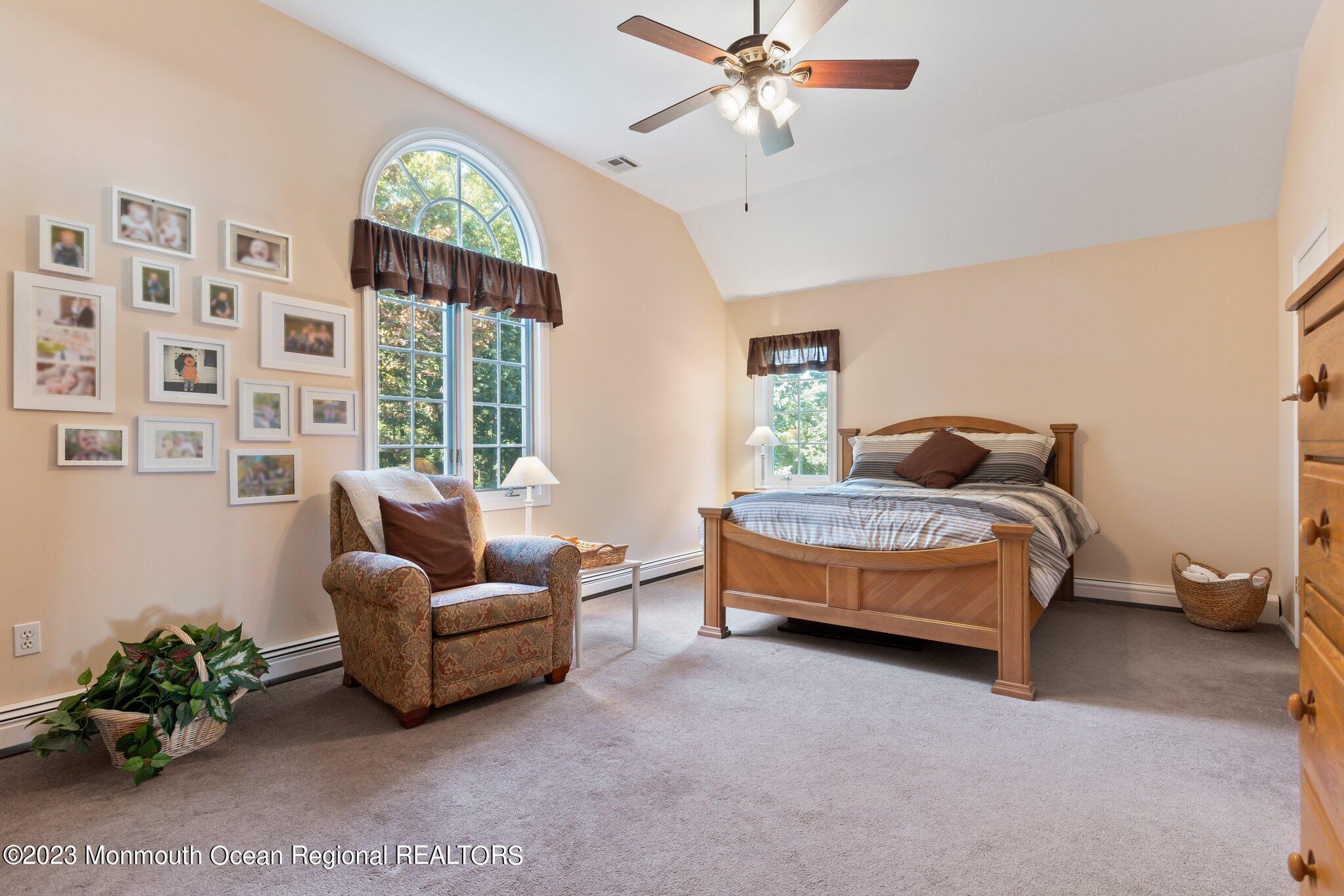1841 Celeste Drive Wall, NJ 07719 - Photo 46 of 107 a bedroom with furniture and a large window