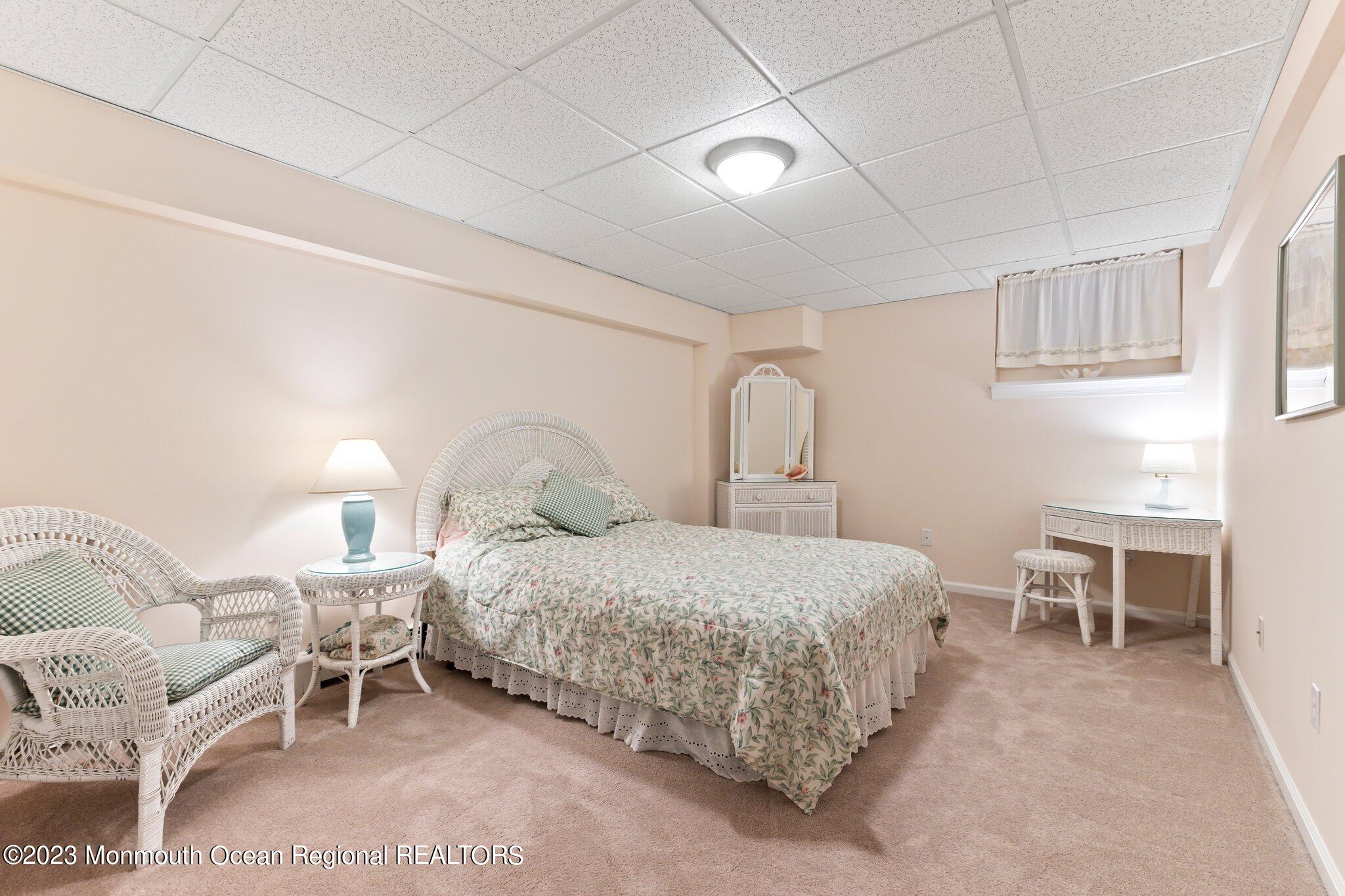 1841 Celeste Drive Wall, NJ 07719 - Photo 61 of 107 a bedroom with a bed and a window
