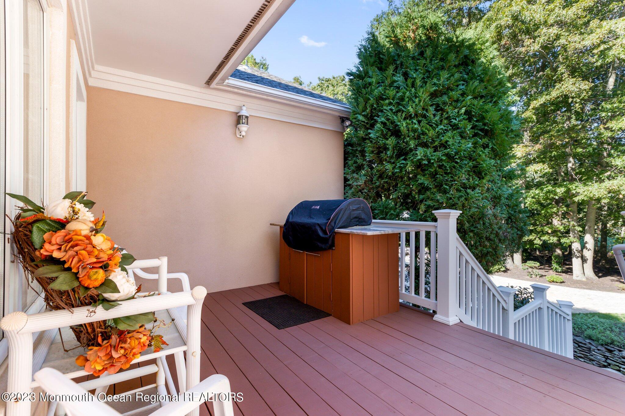 1841 Celeste Drive Wall, NJ 07719 - Photo 71 of 107 a view of a deck with wooden floor and seating space