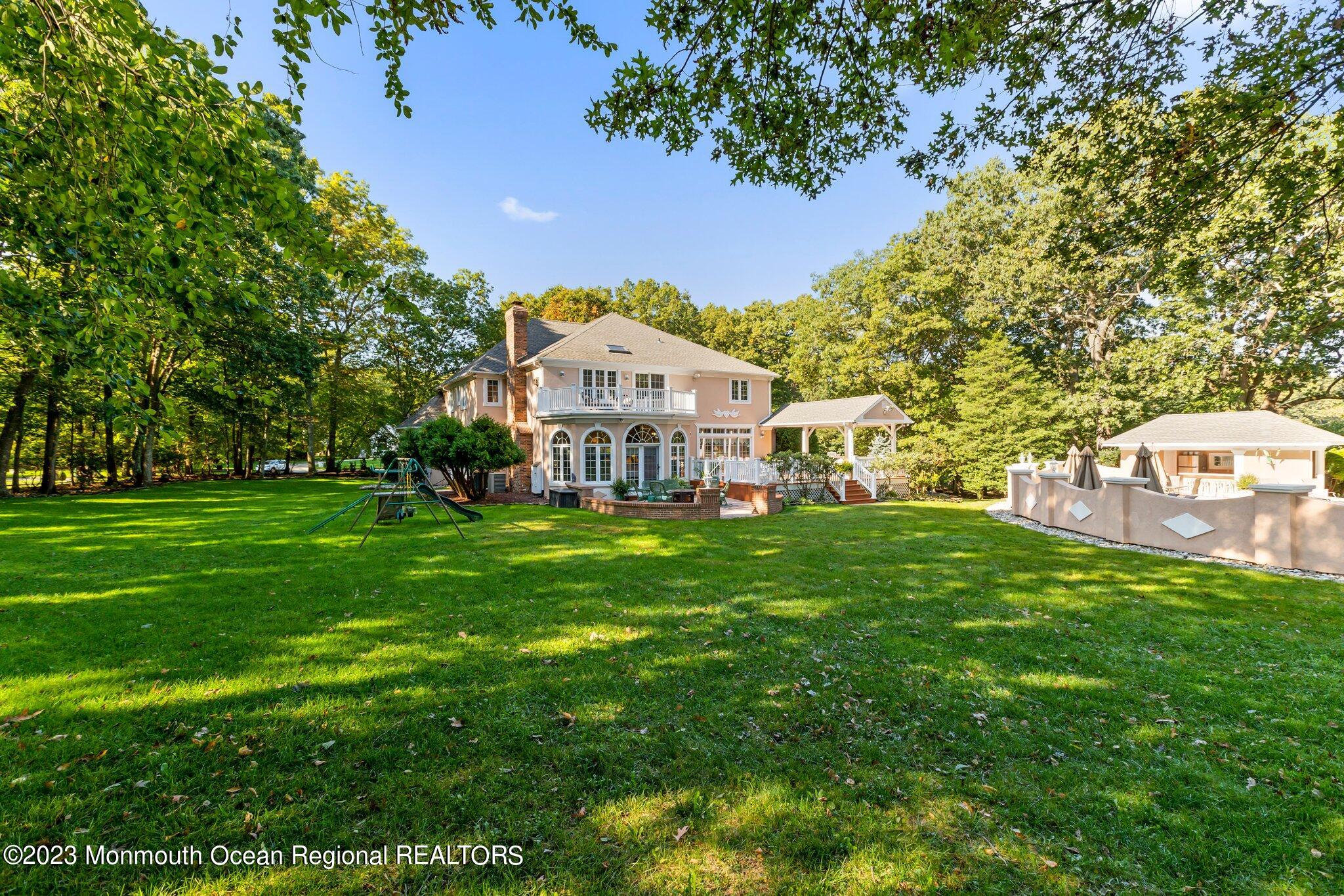 1841 Celeste Drive Wall, NJ 07719 - Photo 82 of 107 a front view of a house with garden