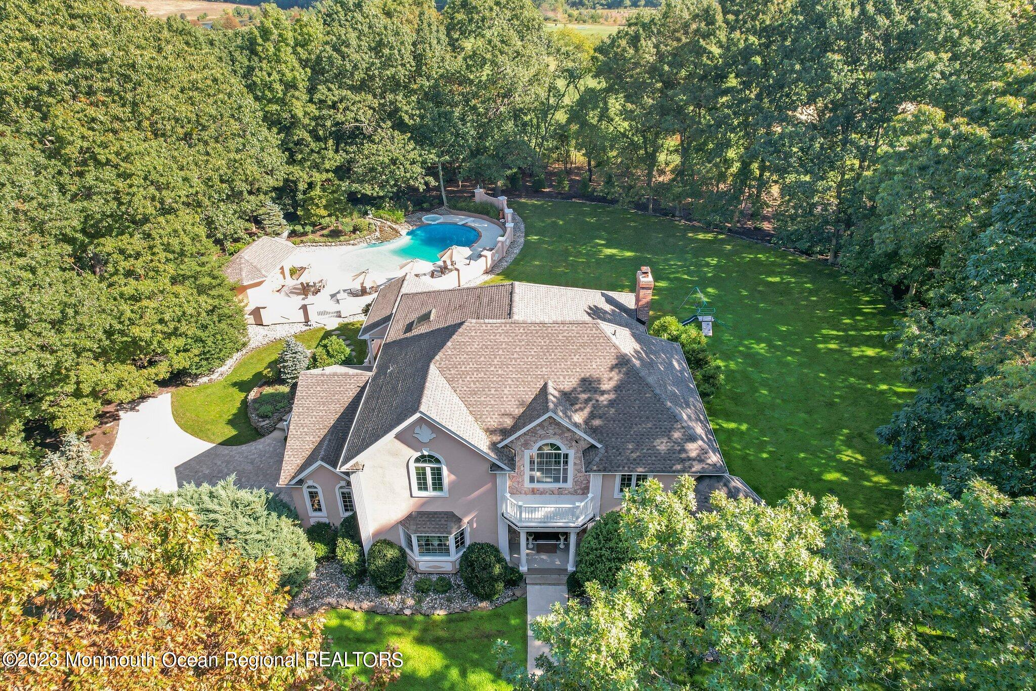 1841 Celeste Drive Wall, NJ 07719 - Photo 100 of 107 an aerial view of a house with swimming pool and garden view