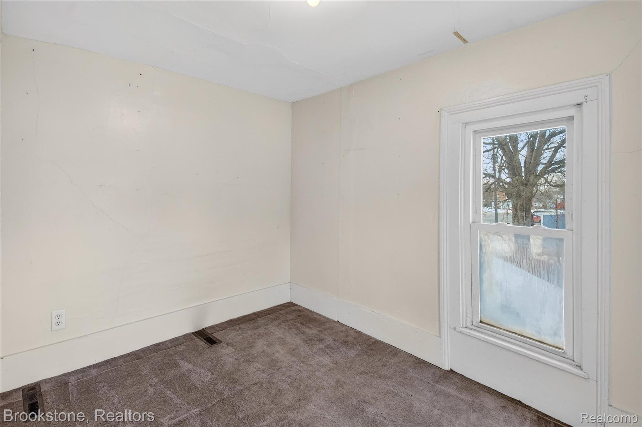 6756 West Beard Road Perry, MI 48872 - Photo 25 of 32 Spare room featuring carpet and baseboards