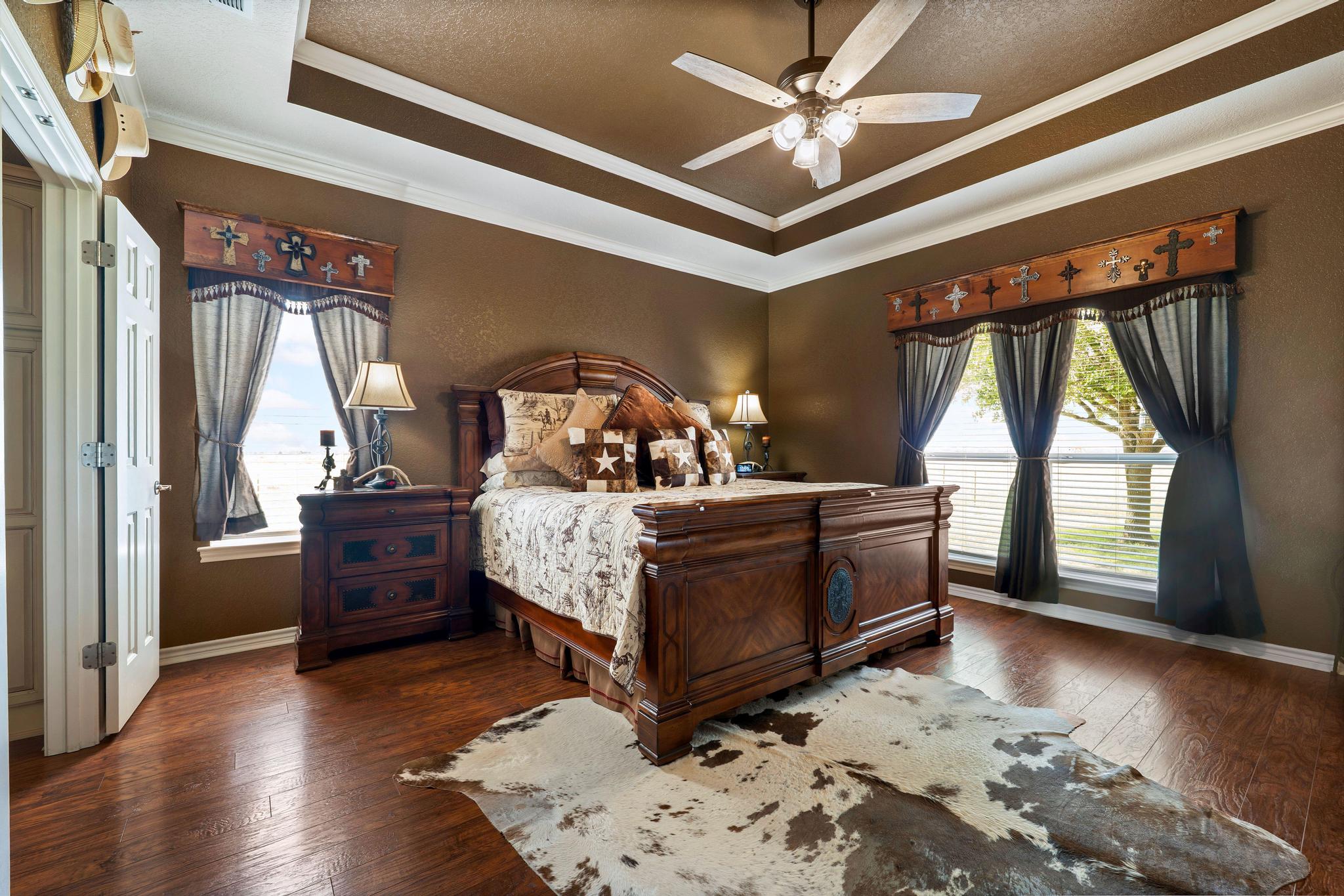 19000 Farm To Market Road 971 Granger, TX 76530 - Photo 16 of 40 The owner's suite is truly a retreat.